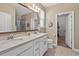 Bathroom featuring double sinks, granite countertops, and a walk-in shower at 1186 Pyxie Moss Dr., Little River, SC 29566