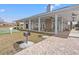 The clubhouse features an outdoor space complete with ceiling fans and gas grills at 1186 Pyxie Moss Dr., Little River, SC 29566