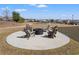 Outdoor fire pit surrounded by Adirondack chairs, perfect for gathering at 1186 Pyxie Moss Dr., Little River, SC 29566