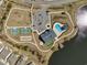 An aerial view showing the pool, tennis and bocce courts and parking for the community at 1186 Pyxie Moss Dr., Little River, SC 29566