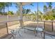 Relaxing screened porch with comfortable seating and a view of the landscaped backyard at 1186 Pyxie Moss Dr., Little River, SC 29566