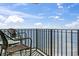 Relax on this balcony with ocean view, stylish seating, and an outdoor table for enjoying the scenery at 1210 N Waccamaw Dr. # 1507, Murrells Inlet, SC 29576