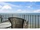Enjoy the ocean view from this private balcony complete with comfortable seating and a small glass table at 1210 N Waccamaw Dr. # 1507, Murrells Inlet, SC 29576