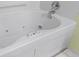 Luxurious bathtub featuring jacuzzi jets and a clean white design at 1210 N Waccamaw Dr. # 1507, Murrells Inlet, SC 29576