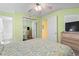 Comfortable bedroom with a queen-size bed, and a ceiling fan at 1210 N Waccamaw Dr. # 1507, Murrells Inlet, SC 29576