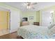 The bedroom features a queen size bed, lots of natural light, and modern decor at 1210 N Waccamaw Dr. # 1507, Murrells Inlet, SC 29576