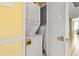 Laundry closet features a stackable washer and dryer at 1210 N Waccamaw Dr. # 1507, Murrells Inlet, SC 29576