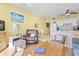 Open-concept living area and kitchen with dining space at 1210 N Waccamaw Dr. # 1507, Murrells Inlet, SC 29576