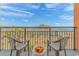 Relax on this charming balcony with ocean view, complete with seating and refreshments to enjoy the scenery at 1501 Ocean Blvd. S # 607, Myrtle Beach, SC 29577