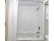 Clean bathroom with shower-tub combo with white shower curtain and fresh towels at 1501 Ocean Blvd. S # 607, Myrtle Beach, SC 29577