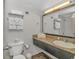 Bright bathroom featuring granite countertop, vanity sink, plush towels, and ample lighting at 1501 Ocean Blvd. S # 607, Myrtle Beach, SC 29577