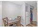 Functional dining area with full sized refrigerator and ironing board at 1501 Ocean Blvd. S # 607, Myrtle Beach, SC 29588
