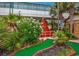 Lush mini-golf course with tropical plants and unique obstacles, offering a fun outdoor activity at 1501 Ocean Blvd. S # 607, Myrtle Beach, SC 29577