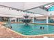 Indoor pool featuring a center fountain, lounge chairs, and ample space for relaxing at 1501 Ocean Blvd. S # 607, Myrtle Beach, SC 29577