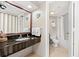 Bathroom with granite vanity, tiled floors, and a shower with a white shower curtain at 1501 S Ocean Blvd. S # 1147, Myrtle Beach, SC 29577