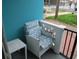 Cozy balcony seating area with nautical themed cushions at 1600 S Ocean Blvd. # 148, Myrtle Beach, SC 29577