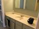 Bathroom with a light countertop, sink, mirror and cabinets at 1600 S Ocean Blvd. # 148, Myrtle Beach, SC 29577
