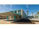 View of the Wave Rider hotel with palm trees at 1600 S Ocean Blvd. # 148, Myrtle Beach, SC 29577