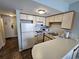 Kitchen with white appliances and ample counter space at 1605 South Ocean Blvd. # 1902, Myrtle Beach, SC 29577