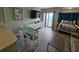 Bright living room with sleeper sofa, dining room and partial ocean view at 1605 South Ocean Blvd. # 1902, Myrtle Beach, SC 29577