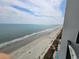 Scenic view of the beach and ocean from a high-rise balcony offering tranquil waterfront living and relaxation at 1605 South Ocean Blvd. # 1902, Myrtle Beach, SC 29577