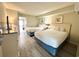 Bright bedroom featuring two queen beds, light wood floors and simple, attractive decor at 201 S Ocean Blvd. # 717, Myrtle Beach, SC 29577