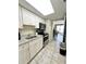 Functional kitchen with a stainless steel range and a sink at 201 S Ocean Blvd. # 717, Myrtle Beach, SC 29577