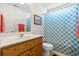 Bright bathroom featuring vanity, a framed picture, toilet, and patterned shower curtain at 2029 Hawksmoor Dr., Conway, SC 29526