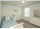 Cozy bedroom with natural light and coastal decor at 204 Juniata Loop, Little River, SC 29566