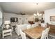 Open-concept living space with a dining area, modern furnishings, and a cozy atmosphere at 204 Juniata Loop, Little River, SC 29566
