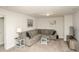 Cozy living room with large sectional sofa, stylish tables, and beach-themed decor at 204 Juniata Loop, Little River, SC 29566