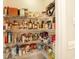 Walk-in pantry with wire shelving stocked with food and household items at 204 Juniata Loop, Little River, SC 29566