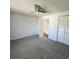 Inviting bedroom with closet space, ceiling fan and neutral carpet, providing a cozy retreat at 217 N Myrtle St. # 1, Myrtle Beach, SC 29577