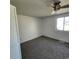 Comfortable bedroom with neutral carpet, a ceiling fan and bright, natural light at 217 N Myrtle St. # 1, Myrtle Beach, SC 29577