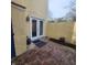 Private brick courtyard with french doors, offering a charming and secluded outdoor space at 217 N Myrtle St. # 1, Myrtle Beach, SC 29577