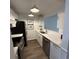 Well-lit kitchen featuring stainless steel appliances, shaker cabinets and stone counter tops at 217 N Myrtle St. # 1, Myrtle Beach, SC 29577