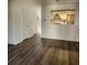 Living room with hard wood floors leading to the kitchen, perfect for entertaining at 217 N Myrtle St. # 1, Myrtle Beach, SC 29577