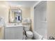 Bright bathroom featuring a vanity, toilet, and shower-tub combo, providing a functional and clean space at 2201 S Ocean Blvd. # 1707, Myrtle Beach, SC 29577