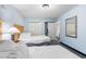 Spacious bedroom featuring two beds, ample closet space, and a comfortable sleeping arrangement at 2201 S Ocean Blvd. # 1707, Myrtle Beach, SC 29577