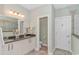 Bathroom featuring a double vanity with granite counters and tiled flooring at 2212 Via Palma Dr., North Myrtle Beach, SC 29582
