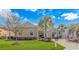 Beautiful single-story home with well-manicured lawn and lush landscaping and inviting curb appeal at 2212 Via Palma Dr., North Myrtle Beach, SC 29582