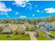 Gorgeous home nestled in a beautiful community, complete with lush landscaping, green lawn, and circular driveway at 2212 Via Palma Dr., North Myrtle Beach, SC 29582