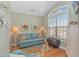 Comfortable sitting room features hardwood floors, large window, and nautical decor at 2212 Via Palma Dr., North Myrtle Beach, SC 29582