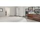 Inviting bedroom showcases a neutral palette, wooden dresser and cozy decor accents at 236 Craigflower Ct., Longs, SC 29568