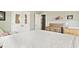 Comfortable bedroom with a large window, white bedding, and ample storage at 236 Craigflower Ct., Longs, SC 29568