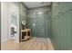 Stylish entryway with wood floors, green accents, decorative wallpaper and convenient coat hooks at 236 Craigflower Ct., Longs, SC 29568