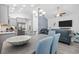 Open layout of the kitchen, dining area, and living room, with consistent design and cohesive style at 2406 Seabreeze Pl., Myrtle Beach, SC 29577