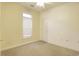 Neutral bedroom featuring neutral walls, plush carpet, and lots of natural light at 264 La Patos Dr., Myrtle Beach, SC 29588