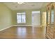 Inviting living room featuring laminate wood floors, neutral walls, and lots of natural light at 264 La Patos Dr., Myrtle Beach, SC 29588