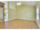 Open-concept living room with laminate wood floors and lots of natural light at 264 La Patos Dr., Myrtle Beach, SC 29588